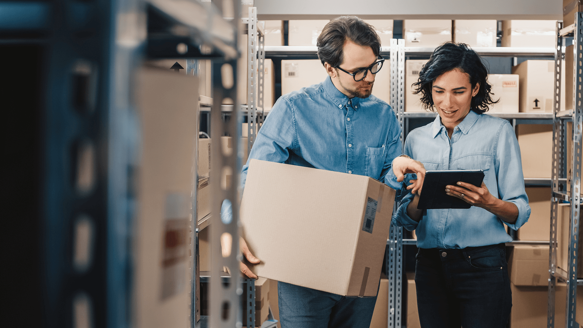 two people in a warehouse