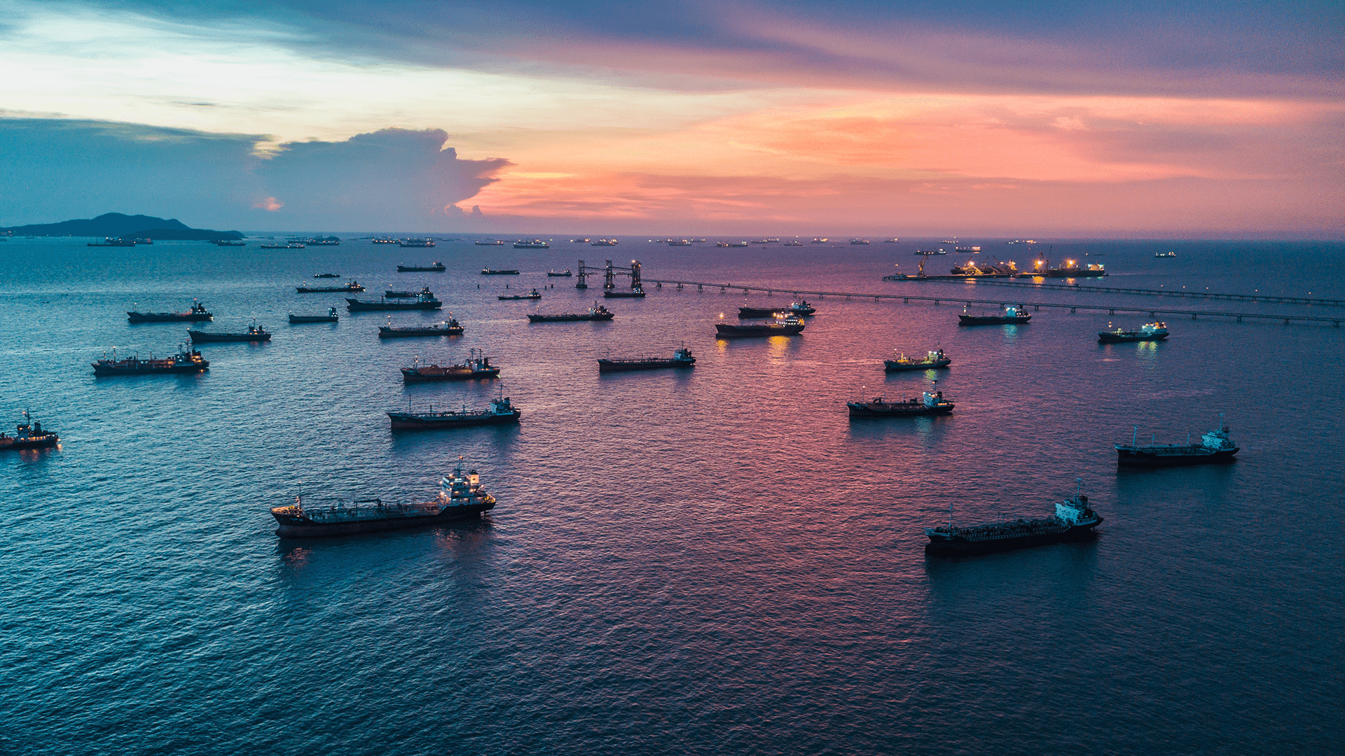  Aerial photo of tanker anchored up for parking in the sea.